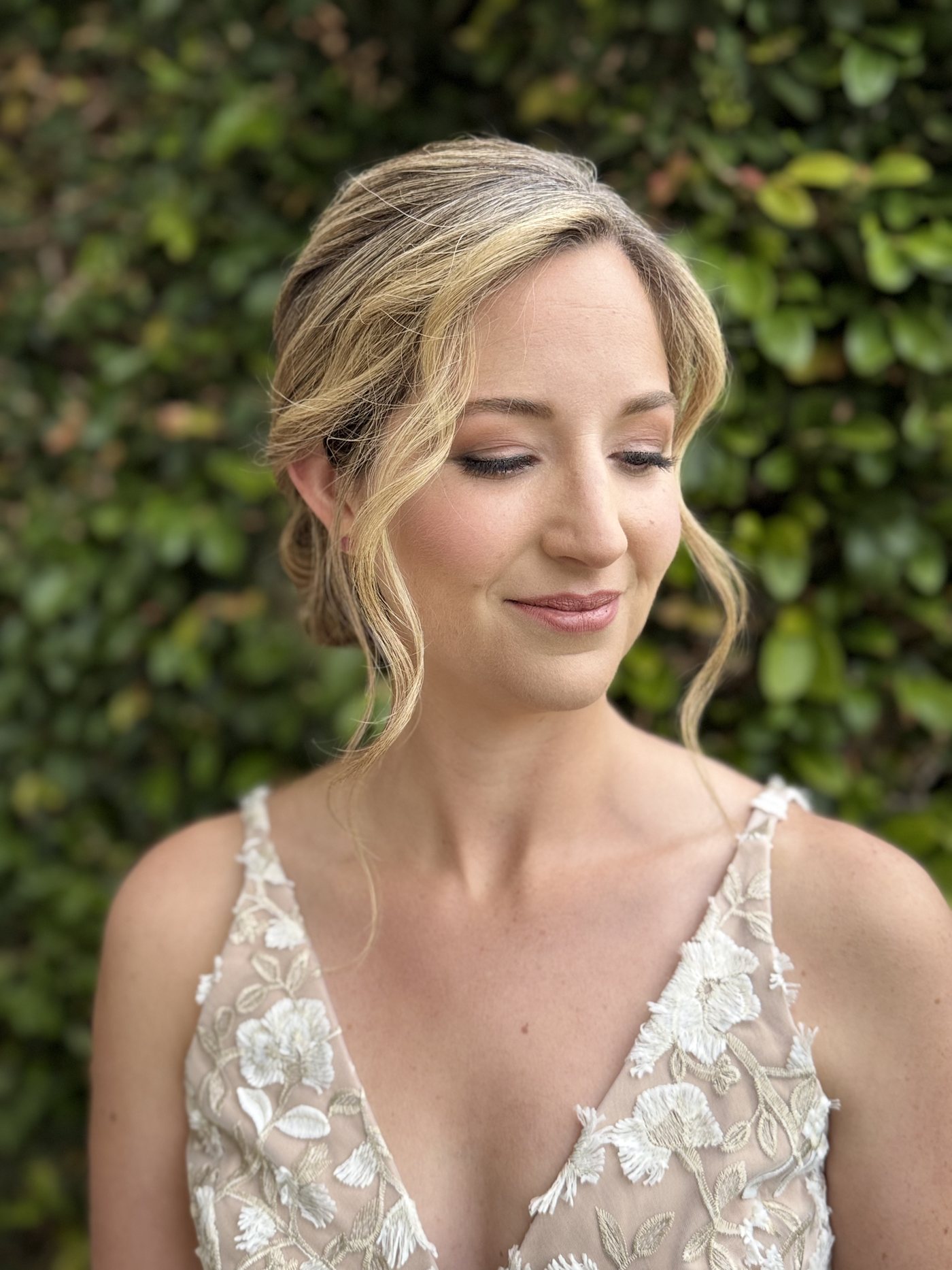 Bride with soft, elevated natural bridal makeup — an alternative to full glam for 2027.