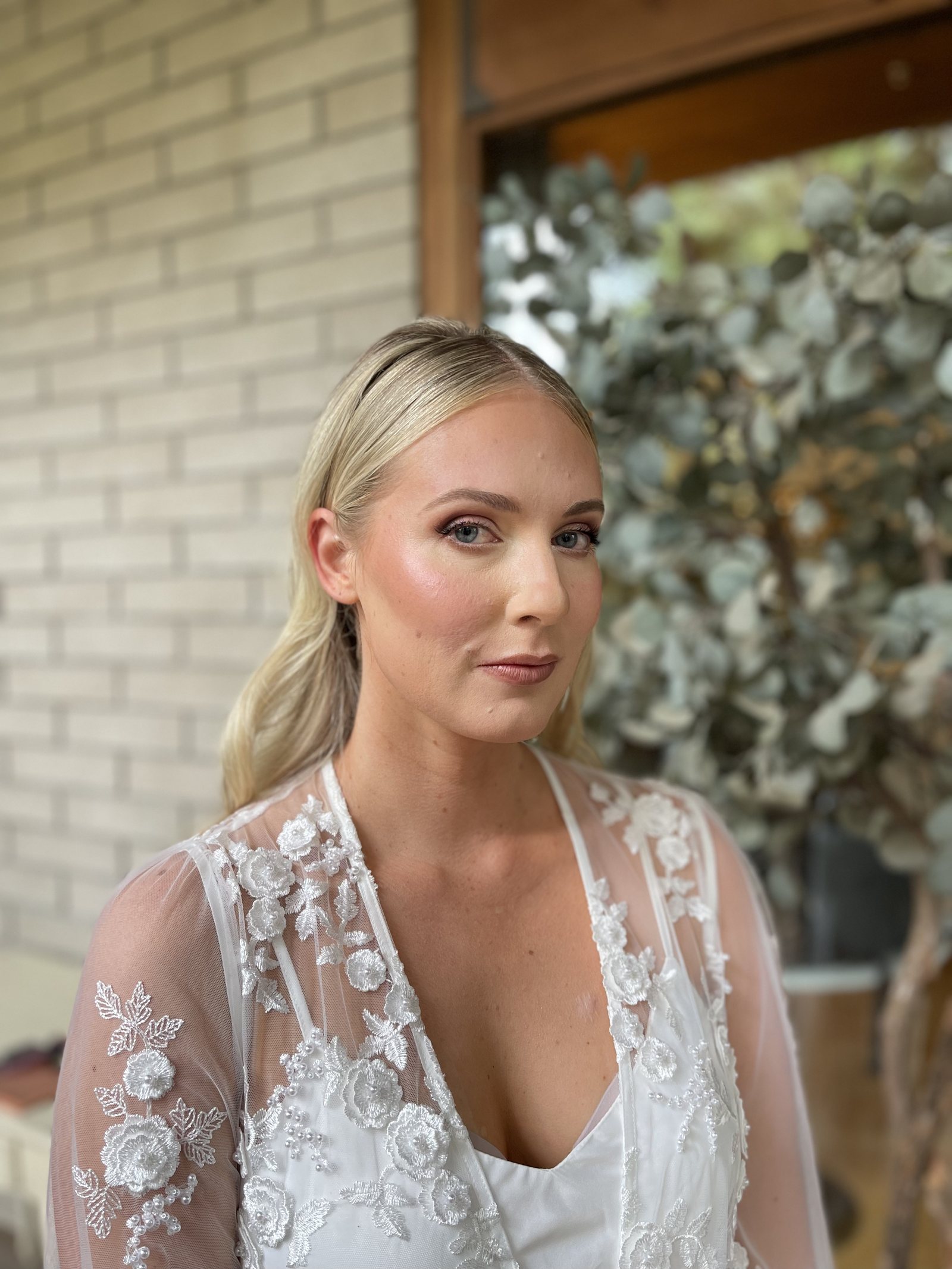 Bride with sculpted, glowing bridal makeup in La Jolla.
